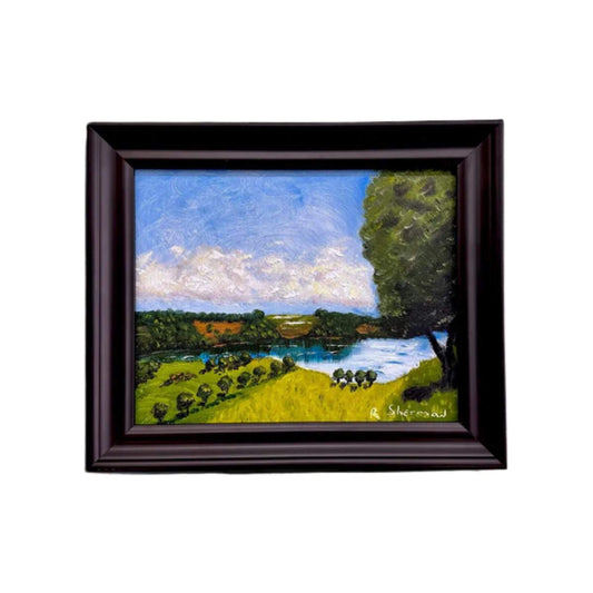 Framed landscape oil painting titled "Valley Vista" featuring a green and blue vista and impasto technique.