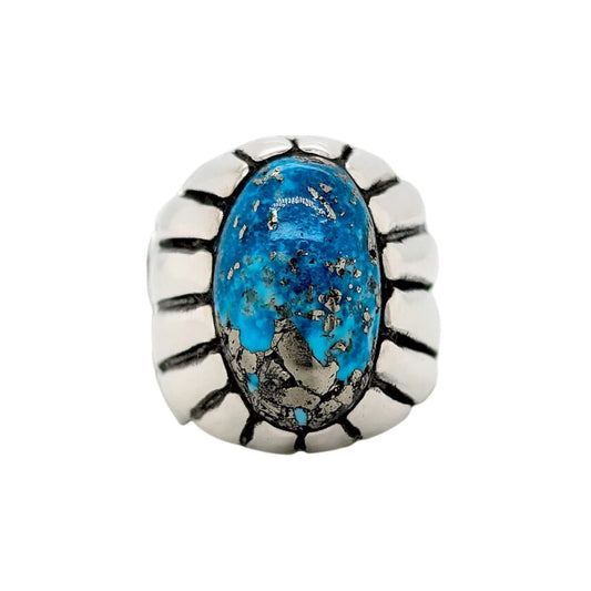 Handmade Southwestern-style sterling silver ring featuring a Kingman turquoise stone with a matrix pattern and radiating sterling silver details