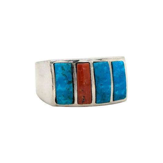 Handmade Southwestern-style turquoise and coral ring in sterling silver. Features three rectangular turquoise stones and one coral stone.