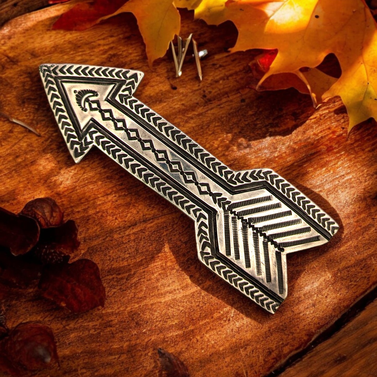 Crossfire Falls | Vintage Sterling Silver Native American Handmade Belt Buckle Featuring Stamped Design and a Detailed Cutout Arrow Design