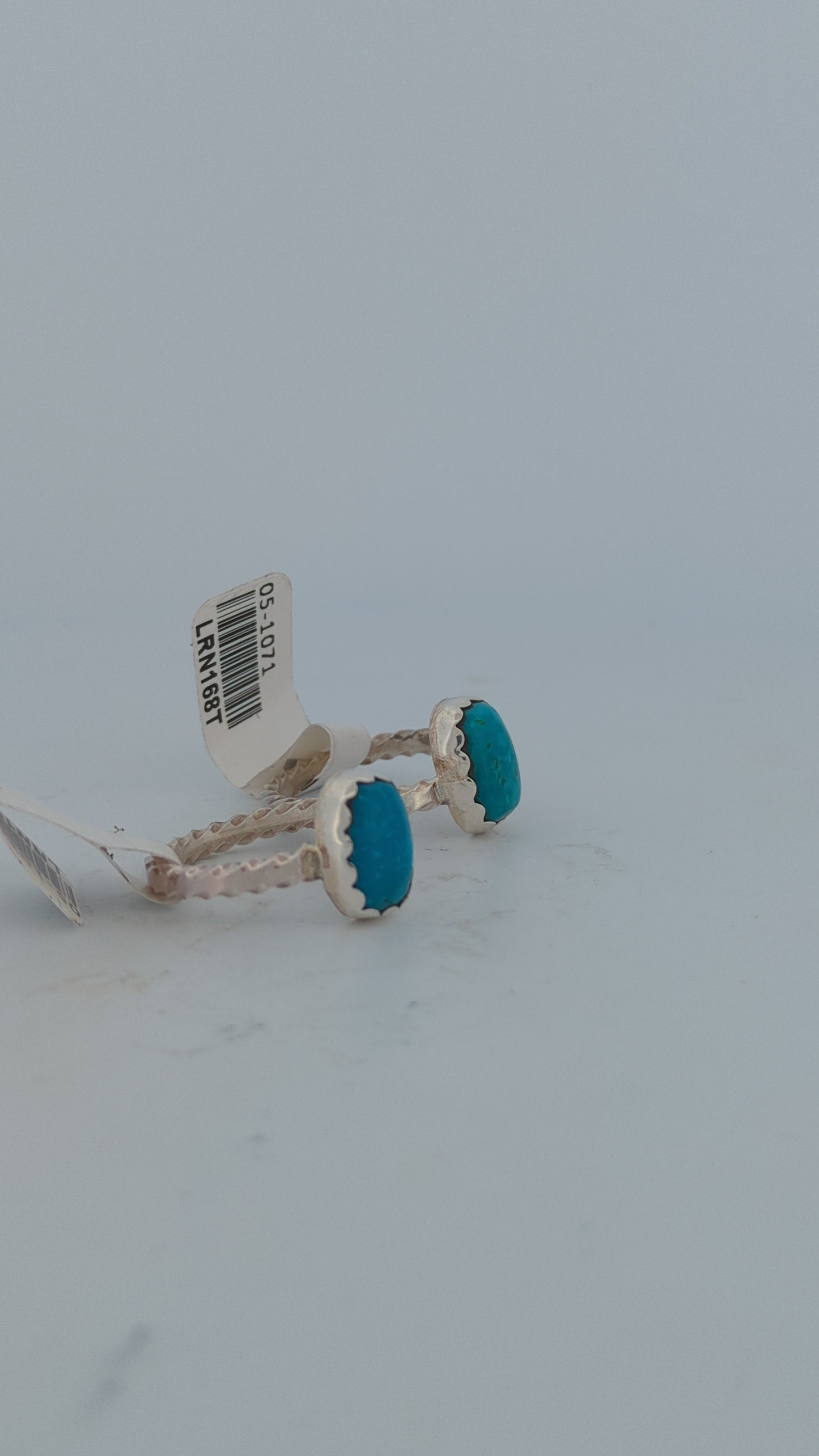 Cimmaron | Sterling silver and turquoise ring with lightening bolt shape shank by Navajo artist Adrian Yazzie